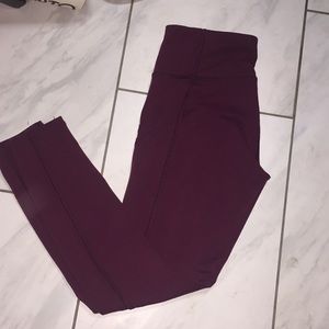 Burgundy Iviva leggings with mesh on side